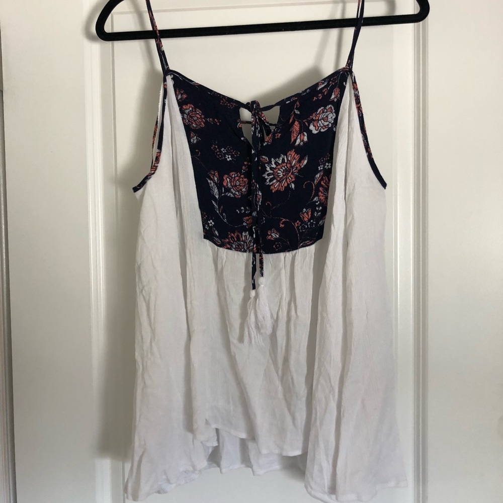 Cold shoulder top with lace-up back